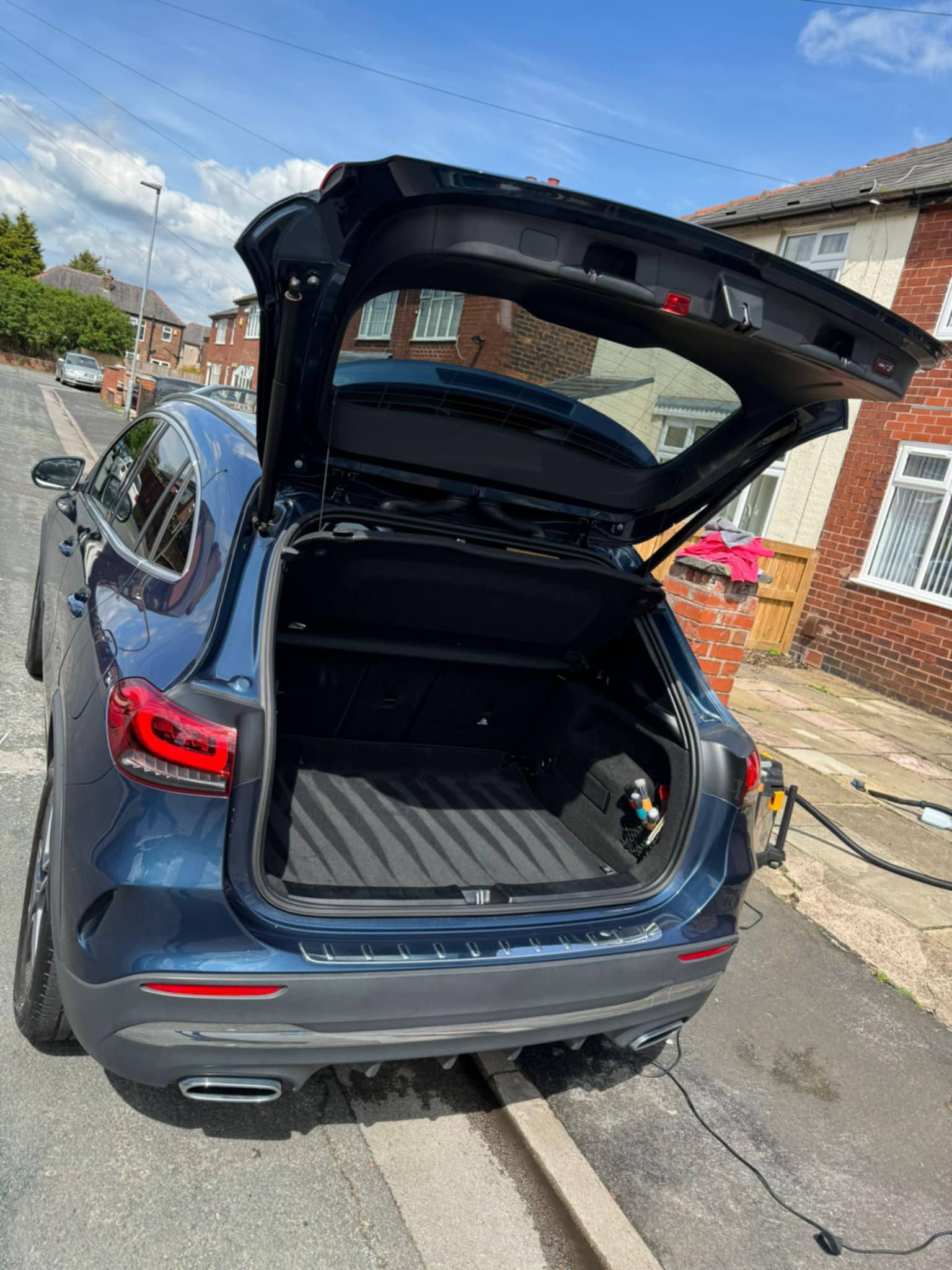 Blue Mercedes GLA with a deep glossy finish after detailing
